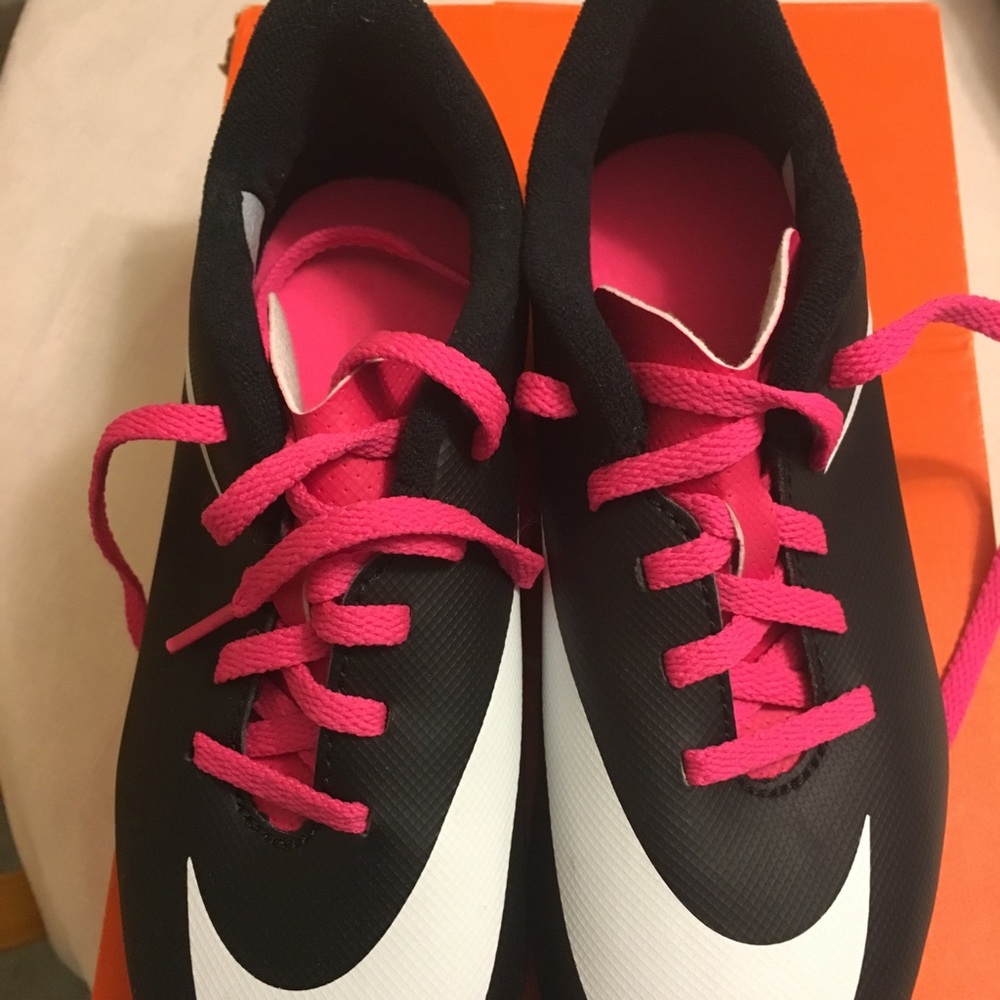 Brand new unused Nike cleats for kids.